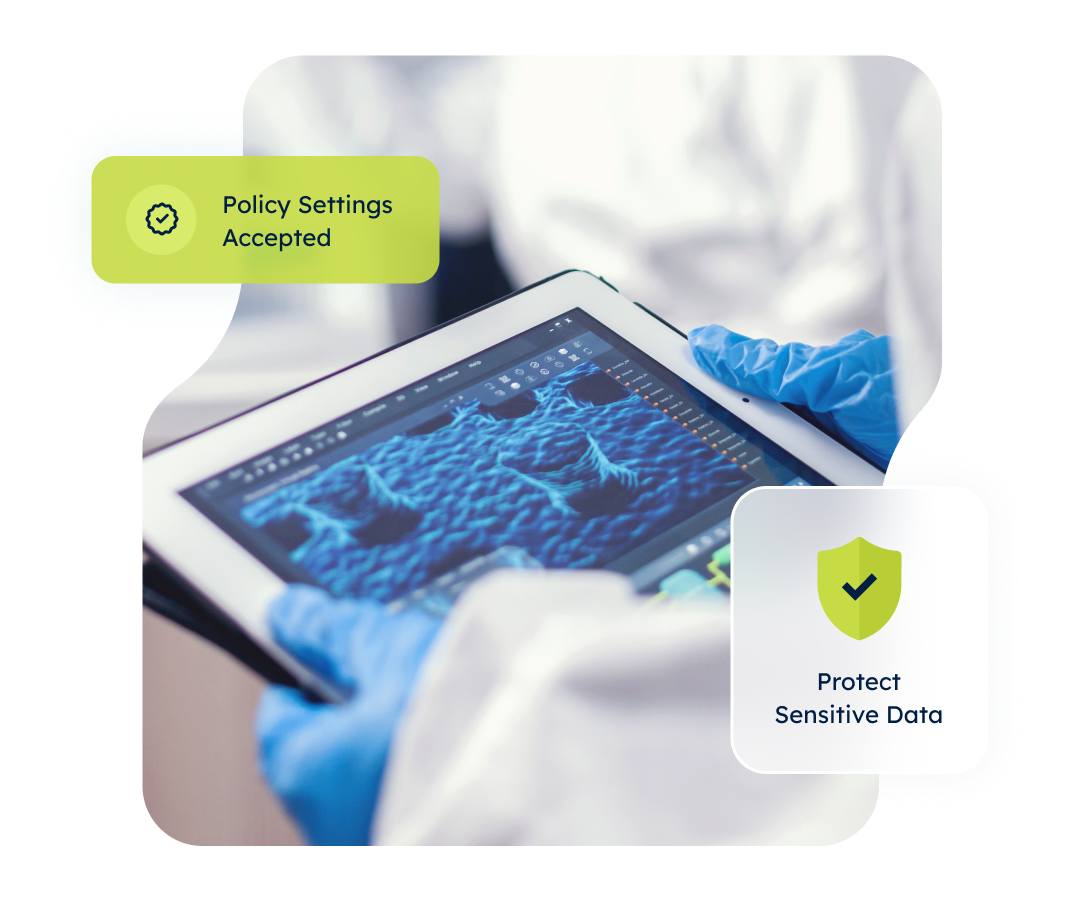 A gloved hand touches a tablet displaying a blue 3D graph. Overlay text indicates accepted policy settings and data protection.